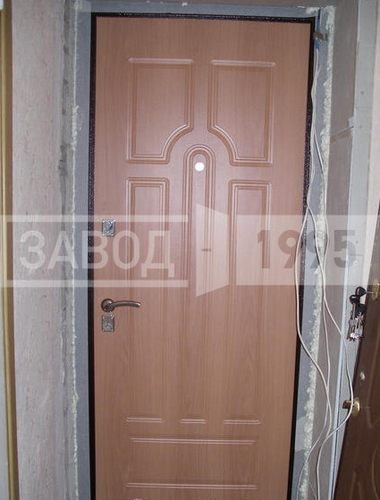 Вид установленной двери с МДФ ПВХ