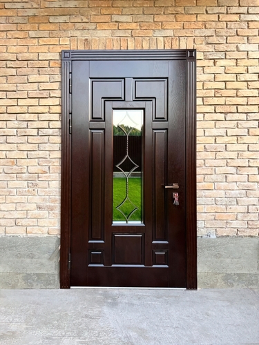 Дверь с отделкой МДФ, стеклопакетом и решеткой